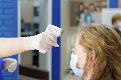 Temperature check of dental staff before starting work