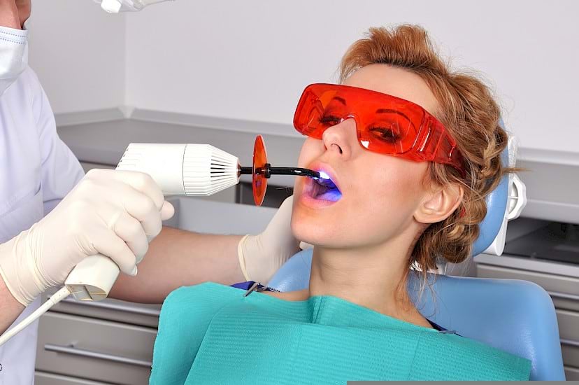 Dental filling in a patient's tooth.