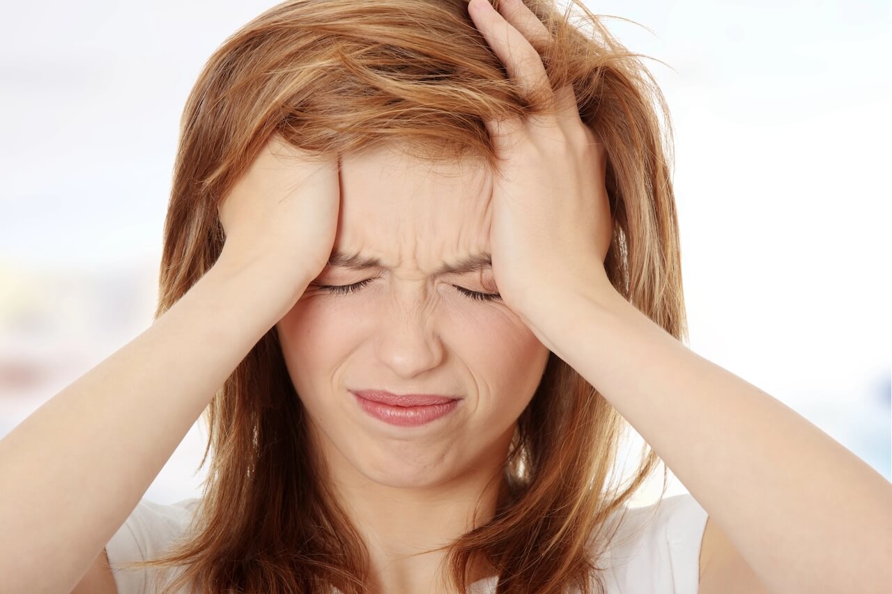 Stressed woman - can it affect dental health?